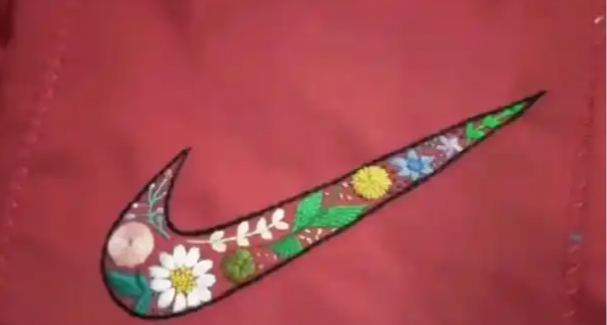 母爱缝进Nike标！当事人已收到 Nike 送的礼物：很沉，一大一小